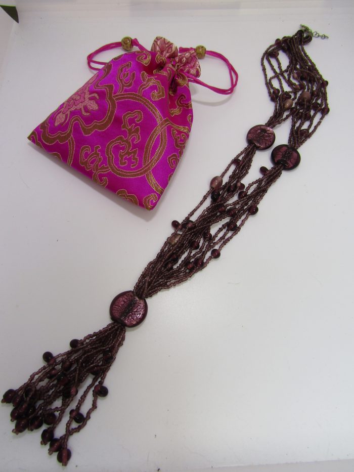 perfect purple beads with cerise brocade bag